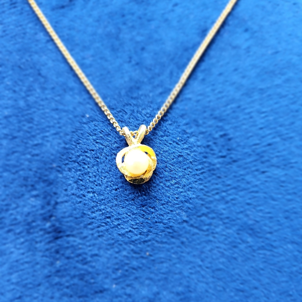 Faux pearl necklace